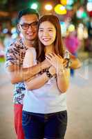 We fell in love in the city. Shot of a happy young couple spending the night out in the city.