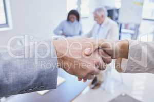 Great things will come from this partnership. Cropped shot of two businesspeople shaking hands in a boardroom.