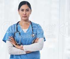 Nursing you back to health is of utmost importance. Shot of a medical practitioner standing with her arms crossed.