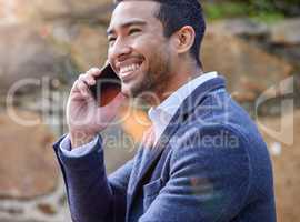 Your voice soothes me. Shot of a businessman using his smartphone to make a phone call.