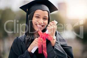 Persist until something happens. Cropped portrait of an attractive young female student celebrating on graduation day.