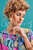 I got my hair permed and my makeup done. Studio shot of a beautiful young woman wearing a 80s outfit.