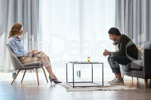 Its incredibly liberating to spend an hour talking to someone. Shot of a young woman having a therapeutic session with a psychologist.