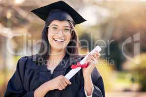 Who wants to hire me. Shot of a young woman holding a certificate on graduation day.