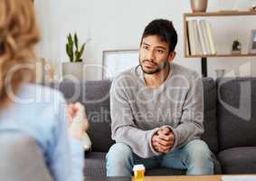 Its my outlet for every negative thing. Shot of a young man having a therapeutic session with a psychologist.