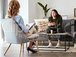 I dont know how people can live without a therapist. Shot of a young woman having a therapeutic session with a psychologist.