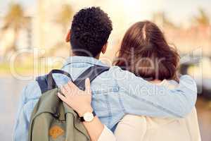 Its a beautiful world out there. Shot of a young couple exploring a city together.