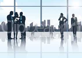 Doing business in the corporate world. Silhouettes of two groups of businesspeople against a city scape.