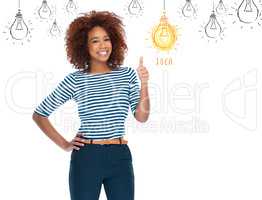 Now theres an inspired idea. Portrait of an attractive young woman showing thumbs up while standing against a white background displaying images of lightbulbs.