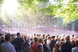 Ready for the big gig. View of a huge crowd at the Skanderborg music festival.