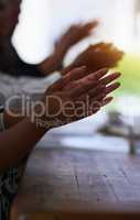 Giving praise where praise is due. Shot of a group of unidentifiable businesspeople applauding at the boardroom table.