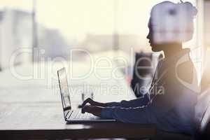 Big dreams require hard work. Cropped shot of a businesswoman working on her laptop in the office.