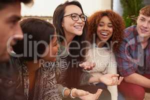 All I need is friends and good times. Cropped shot of a group of friends laughing and having a good time.