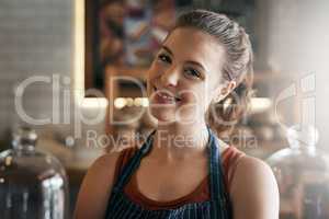 I have your coffee break covered. Portrait of a confident young woman working in a coffee shop.