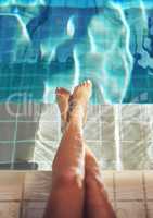 Luxurious legs. Cropped shot of a womans feet in the water of a spa pool.