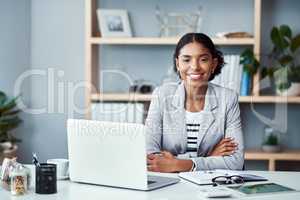 My ambition doesnt have an off switch. Portrait of a young businesswoman working at her desk in a modern office.