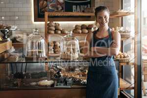 Determine whether owning your own business is for you. Portrait of a confident young woman working in a coffee shop.