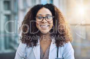 I know from experience that happiness is the best medicine. Portrait of a female doctor standing in a hospital.