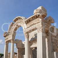 Historical Turkey Ephesus arch in an ancient city. A keystone arch with architectural detail and patterns. Tourist attraction of ancient remains of a temple building in Turkish history and culture