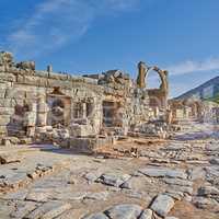 Ancient city ruins of Ephesus in Turkey during the day. Traveling abroad and overseas for holiday, vacation and tourism. Excavated remains of historical building from Turkish history and culture