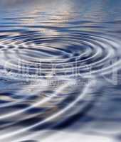 Zoom in on a ripple effect and pattern on a water surface. Creative puddle with abstract circle rings, calm, peaceful and tranquil meditative theme with copyspace. Cool nature wallpaper or background