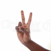 Two minutes please.... Studio shot of an unrecognisable man making a peace sign against a white background.