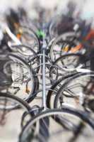 Bikes - lens blurred. A lens blurred photo of lots of parked bikes. Useful as background..