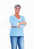Mature woman smiling with hands folded. Casually dressed mature woman smiling over white background with hands folded.
