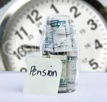 Rather sooner than later. a note reading Pension against a jar filled with money.