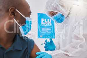 Doctor injecting a patient with covid vaccine. patient being injected with the corona virus cure. Medical professional using a needle to inject covid vaccine. Dedicated healthcare worker in checkup