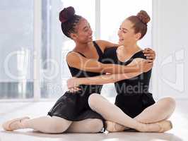 Weve built lifelong bonds. two ballet dancers hugging.