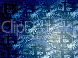 The profits keep piling up. Conceptual image of a bunch of bitcoin against a blue background.