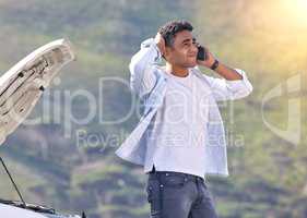 When can you guys get here. Cropped shot of a handsome young man on the phone with roadside assistance after suffering a vehicle breakdown.