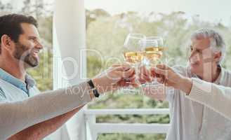 In family relationships love is really spelled t-i-m-e, time. Shot of a family toasting with wine glasses at home.