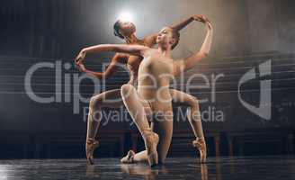 There are shortcuts to happiness, dancing is one of them. a two of ballet dancers practicing a routine on a stage.