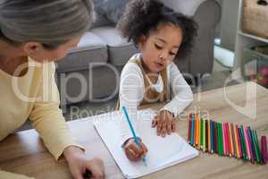 Art therapy is a great resource. Shot of a little girl drawing in a psychologists office.