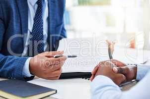 Dont worry about planning every step of your life. Shot of a unrecognizable businessman signing a contract in a office.