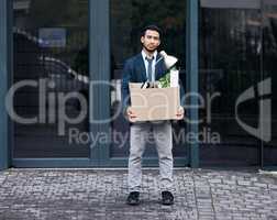 Everything you want is on the other side of fear. a young businessman looking depressed after being retrenched from work.