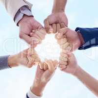 But we can all do small things, with great success. Below shot of a group of unrecognizable businesspeople joining their hands together in a unity.