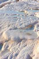 Closeup of travertine pools and terraces in Pamukkale, Turkey. Travelling abroad, overseas for holiday, vacation, tourism. Cotton castle area with carbonate mineral after flowing thermal spring water