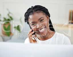 Give your customers your best service. Shot of a confident young businesswoman using her smartphone to make a phone call.