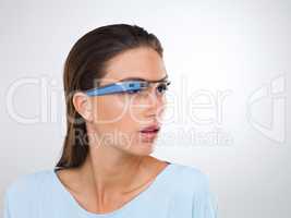 an attractive young woman wearing glasses with internet access.The commercial product(s) or designs displayed in this image represent simulations of a real product, and are changed or altered enough so that they are free of any copyright infringements. Ou