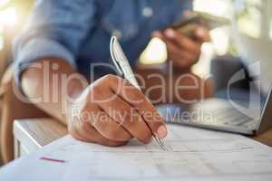 Closeup on hand of businessman filling in insurance form. hands of a businessman filling in banking documents for his budget. Freelance entrepreneur signing a contract to invest. Man signing paperwork