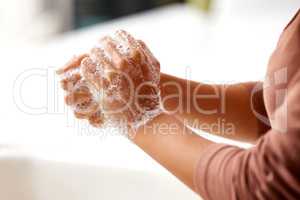 Clean hands and a hygienic lifestyle. a woman washing her hands.