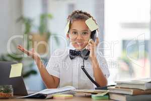 I dont know what more I can do. Shot of an adorable little girl dressed as a businessperson sitting and feeling confused while using a telephone.