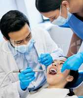 Dedicated to human health. a dentist working on his young patient.