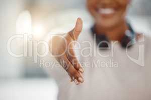 Closeup of one african american businesswoman extending hand forward to greet and welcome with handshake. Networking and meeting for interview to agree on deal or offer. Collaborating on negotiation for job promotion