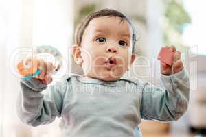 So these are safe to play with. an adorable baby playing with toys at home.