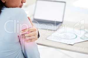 If youre not seated comfortably, your body will tense up. Closeup shot of an unrecognisable businesswoman experiencing arm pain while working in an office.