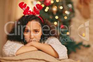Is it over yet. a young woman feeling unhappy during Christmas at home.